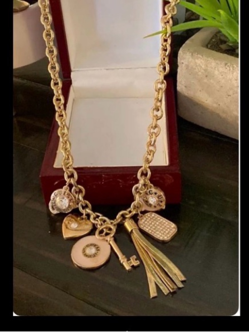 Gold-Tone Charm Necklace with Tassel and Heart Pendant